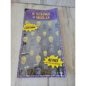Amscan string skull purple black Halloween prop  decor